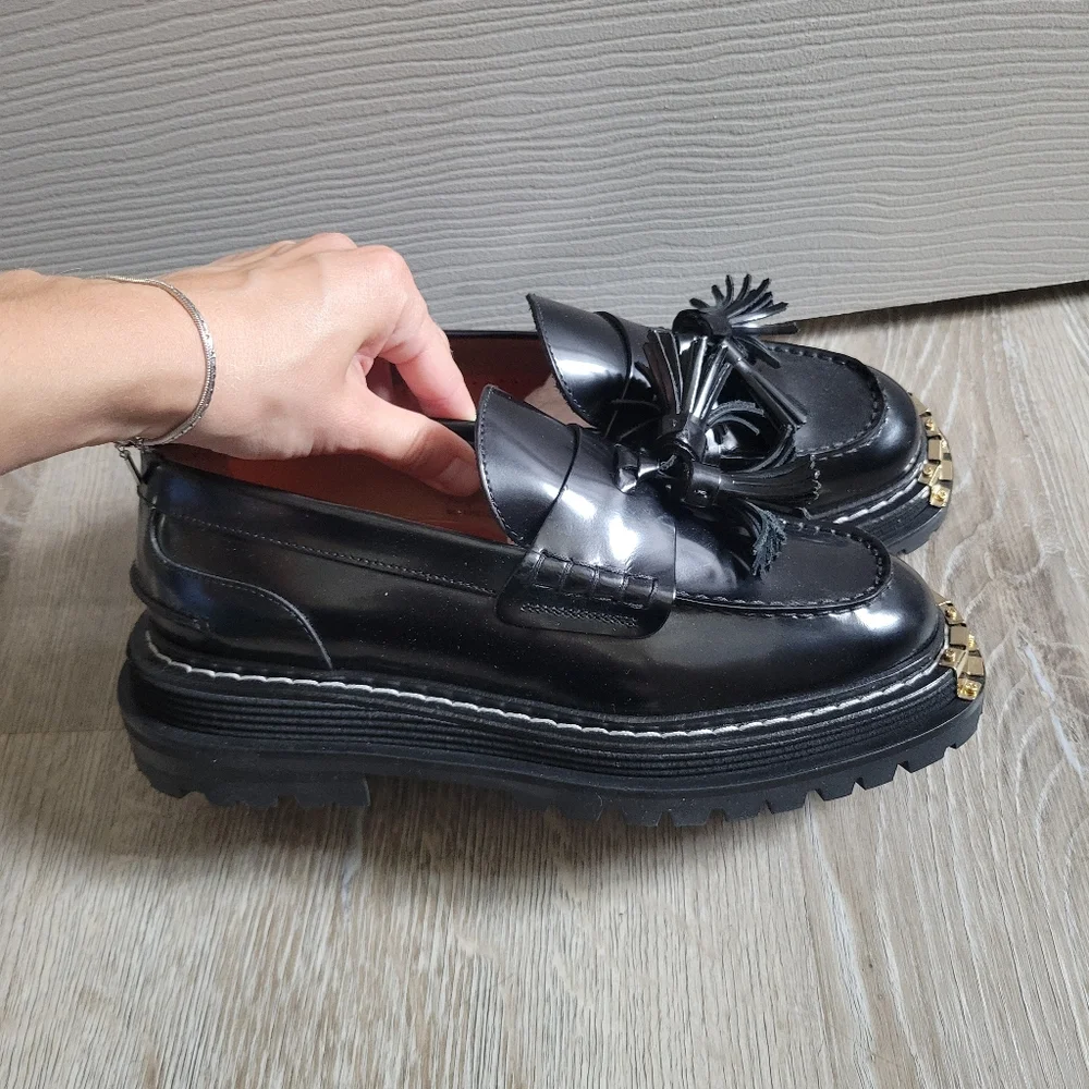 Sandro Black Leather Tassel Loafers with Gold Toe Accent - Picture 2 of 4